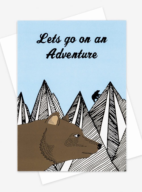 illustration of a brown bear in front of a mountain range with the text 'Lets go on an adventure' above