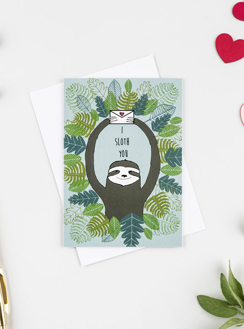 I sloth you card featurng a sloth holding up an enevelope with a heart on. with the text 'I SLoth You'